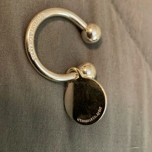 Vintage Tiffany & Co. 2001 Sterling Silver Key Ring with matching 2001 Charm
